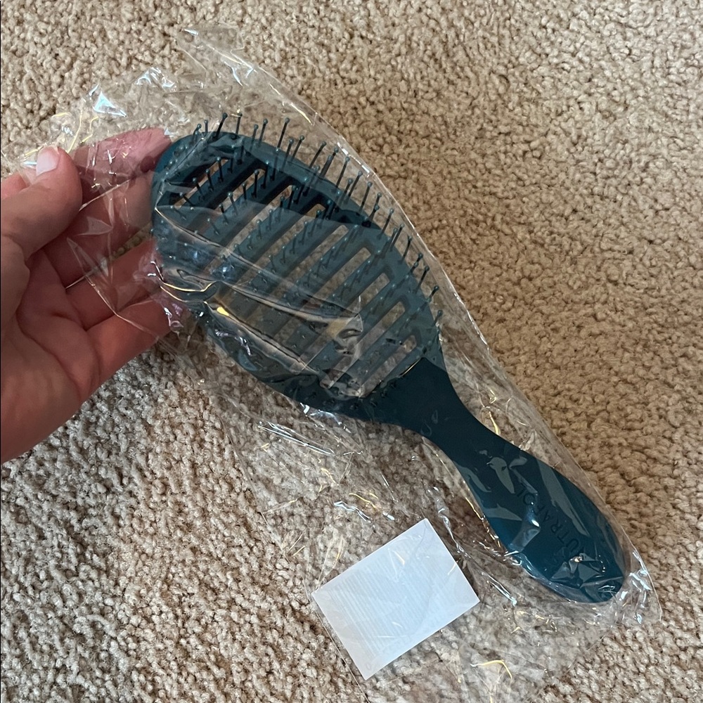 Nutrafol detangle Teal Hair Brush